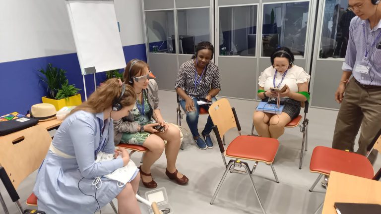 A group of participants including persons with disabilities from various organisations attending the World Urban Forum held in Katowise (Poland) from June 26-30.