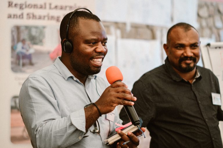 A picture of two participants from the We are Able! consortium partner organisations at a learning event.